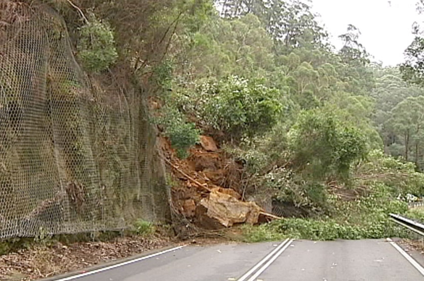 About 1,400 tonnes of rock and debris slipped onto the road on Friday.