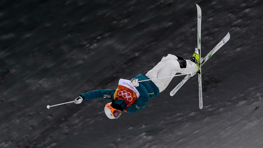 Matt Graham, of Australia, jumps during the men's moguls qualifying at the 2018 Winter Olympics.