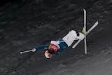 Matt Graham, of Australia, jumps during the men's moguls qualifying at the 2018 Winter Olympics.