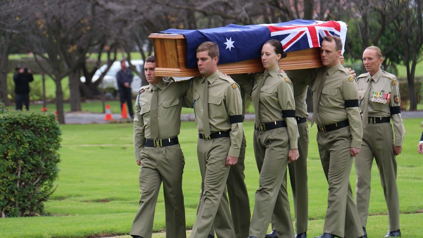 Memorial service for a young soldier who died in Malaysia and whose remains were repatriated to Australia.