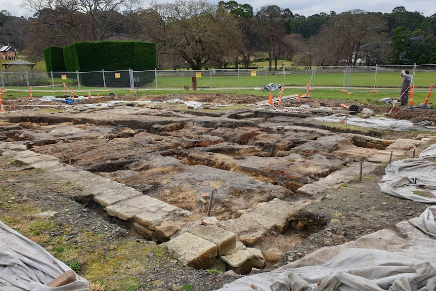 The remains of an old building showing the foundations only