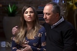 A screenshot from a television interview shows Barnaby Joyce with his arm around Vikki Campion