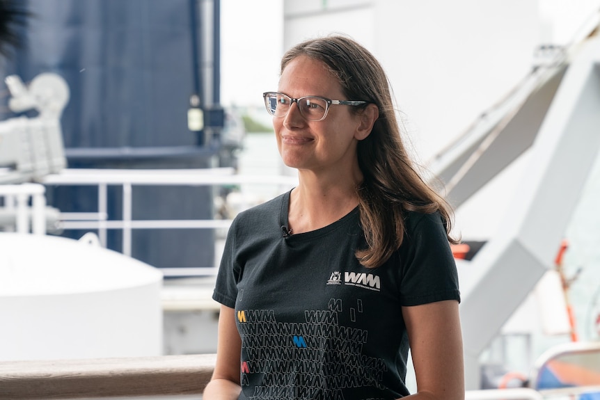 Dr Nerida Wilson smiles for a portrait onboard the research vessel.