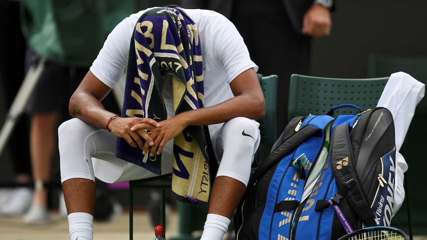 Nick Kyrgios shows his dejection during his first-round match against Pierre-Hugues Herbert at Wimbledon on July 3, 2017.