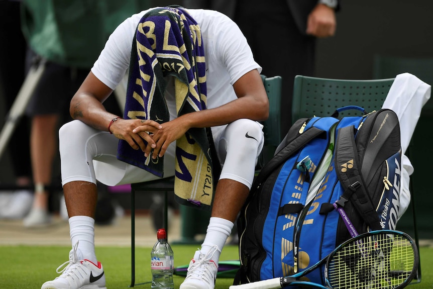 Nick Kyrgios shows his dejection during his first-round match against Pierre-Hugues Herbert at Wimbledon on July 3, 2017.