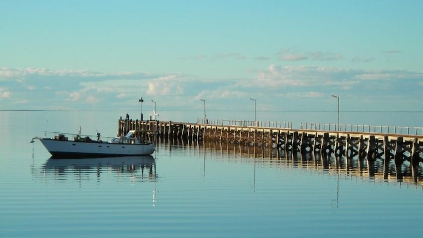 The quiet jetty at Streaky Bay against a picturesque sunset backdrop