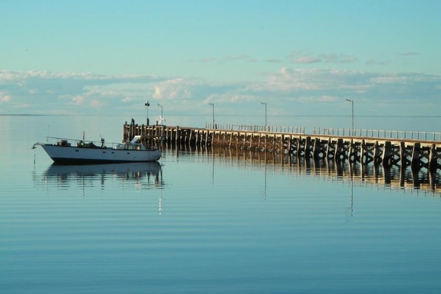 The quiet jetty at Streaky Bay against a picturesque sunset backdrop