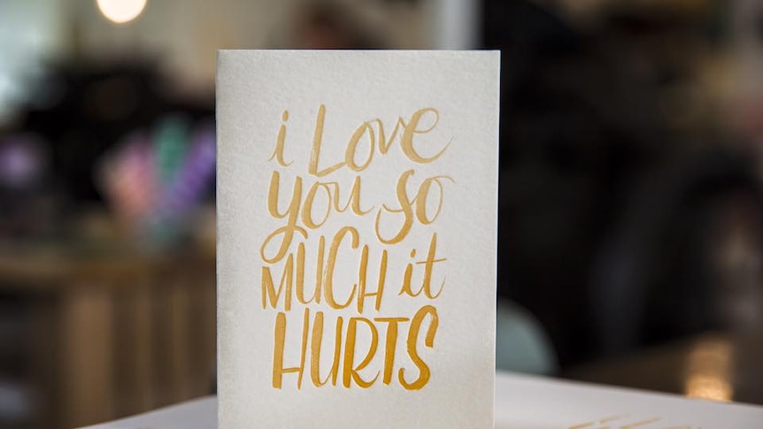 A card reading: "I love you so much it hurts."