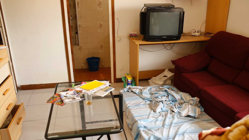 A mattress lies  on the floor in an apartment where neighbours say an Imam lived in Ripoll.