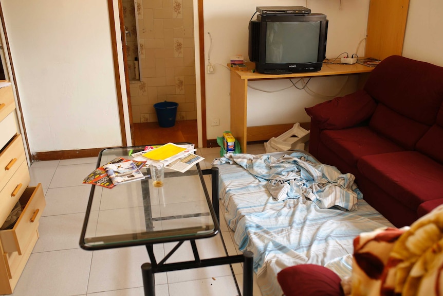 A mattress lies  on the floor in an apartment where neighbours say an Imam lived in Ripoll.