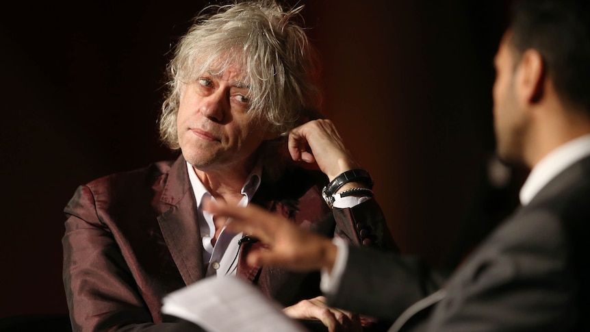 Bob Geldof called the lack of effort shown by wealthy nations to stop HIV a 'scandal'.