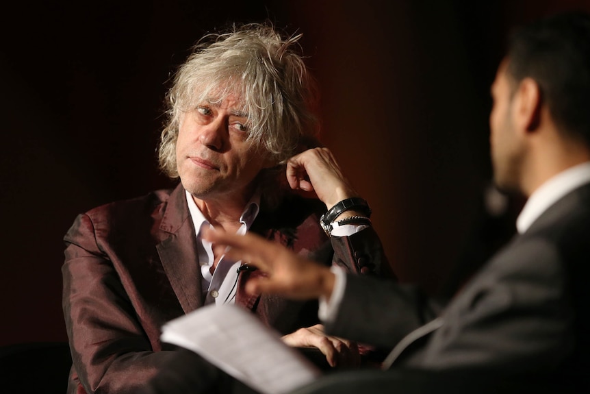 Bob Geldof called the lack of effort shown by wealthy nations to stop HIV a 'scandal'.