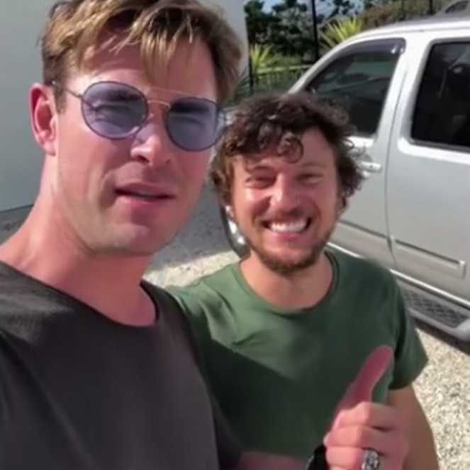 Actor Chris Hemsworth and musician Scott Hildebrand standing together.