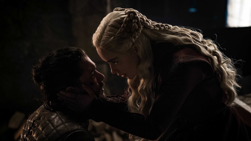 Daenerys Targaryen and Jon Snow embrace in a still image from HBO's Game of Thrones