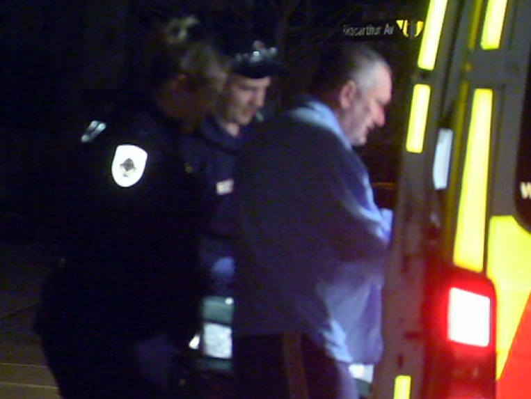 Stephen Dank  getting into ambulance