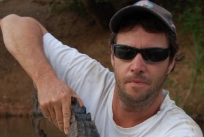 David Morgan holding a crocodile