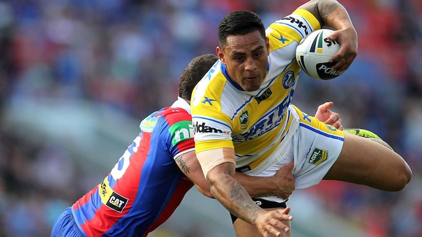 The Eels' Reni Maitua is tackled in the round 26, 2013 match against Newcastle.