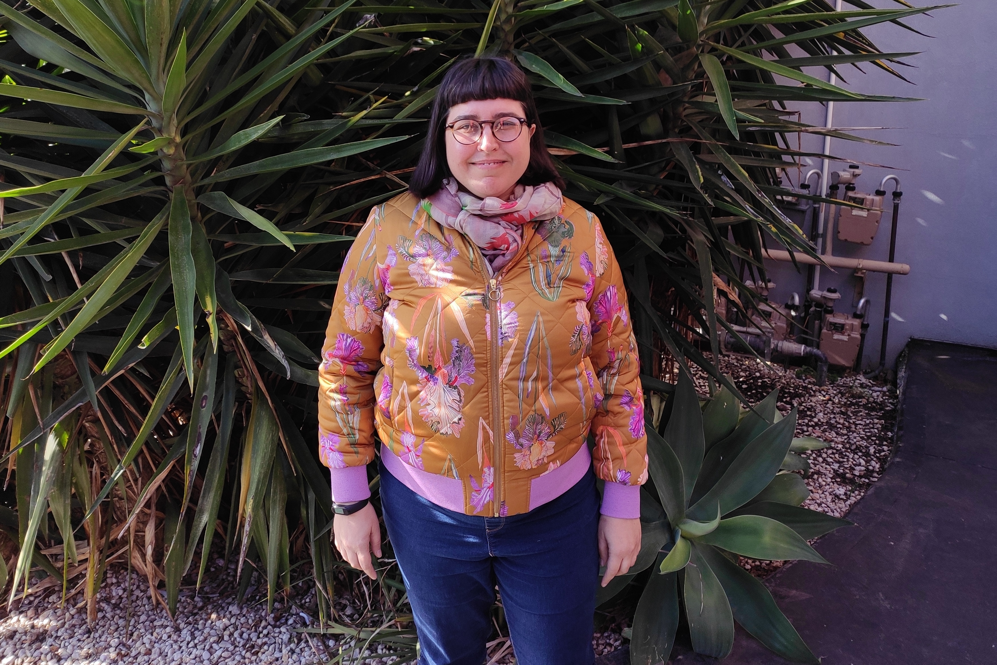 Carla Donnelly stands in front of plants for a story about salary sacrificing into super.