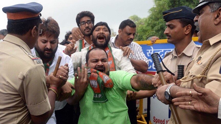 Police arrest supporters of India's Bharatiya Janata Party (BJP) for their petition to withdraw the death sentence of Yakub Memon