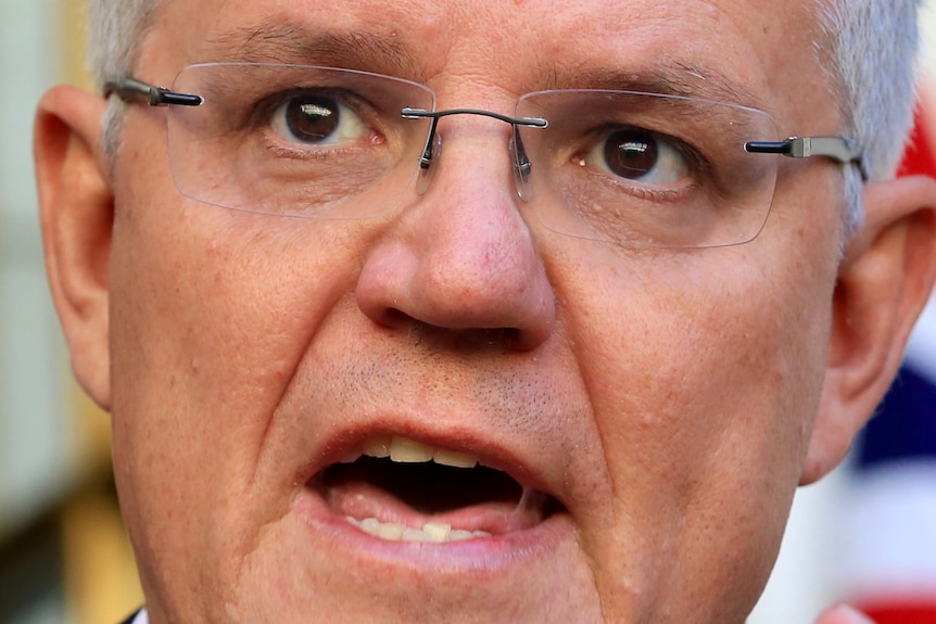 Scott Morrison pointing with his mouth open