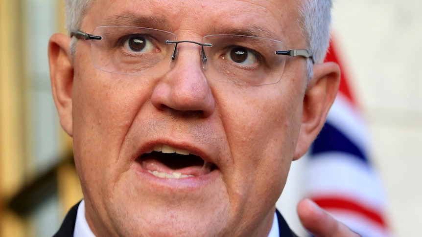 Scott Morrison pointing with his mouth open