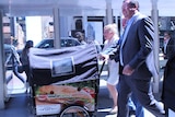 Alannah McTiernan, Terry Condipodero and Eddie Rigg with the food cart on the streets of Perth