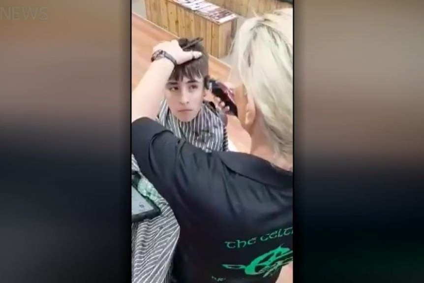 Jordie, 12, who has autism and is non-verbal, gets a haircut