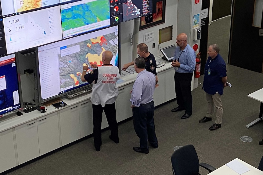 Queensland Fire and Emergency Service personnel monitoring the Fraser Island fire.