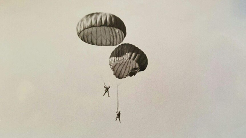 Martin Rollins and a colleague get tangled in a parachute emergency during training