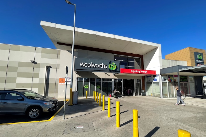 The outside of Woolworths Epping North on a blue-sky day.