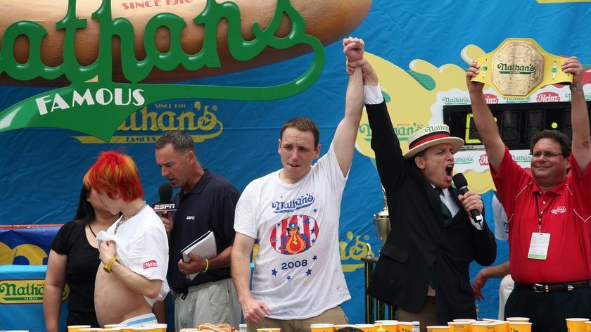 Hard to stomach: Joey Chestnut claims victory in the July 4 hot dog eating contest.