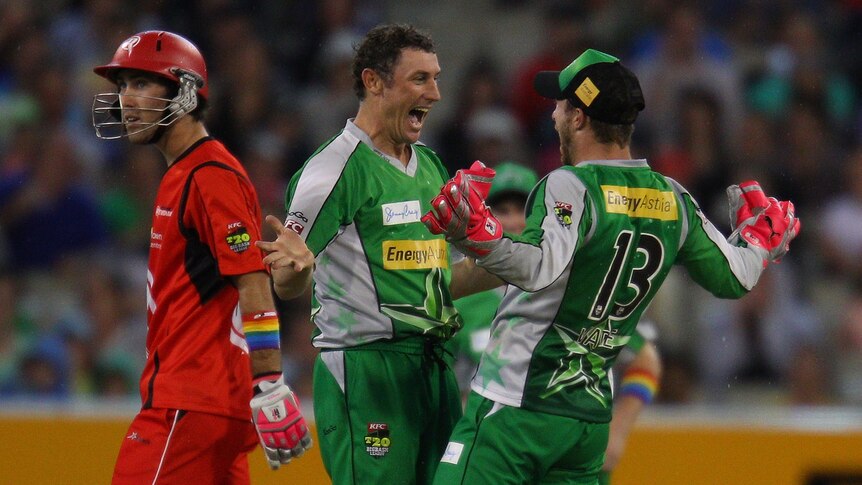David Hussey takes a wicket for the Melbourne Stars in last year's Big Bash.
