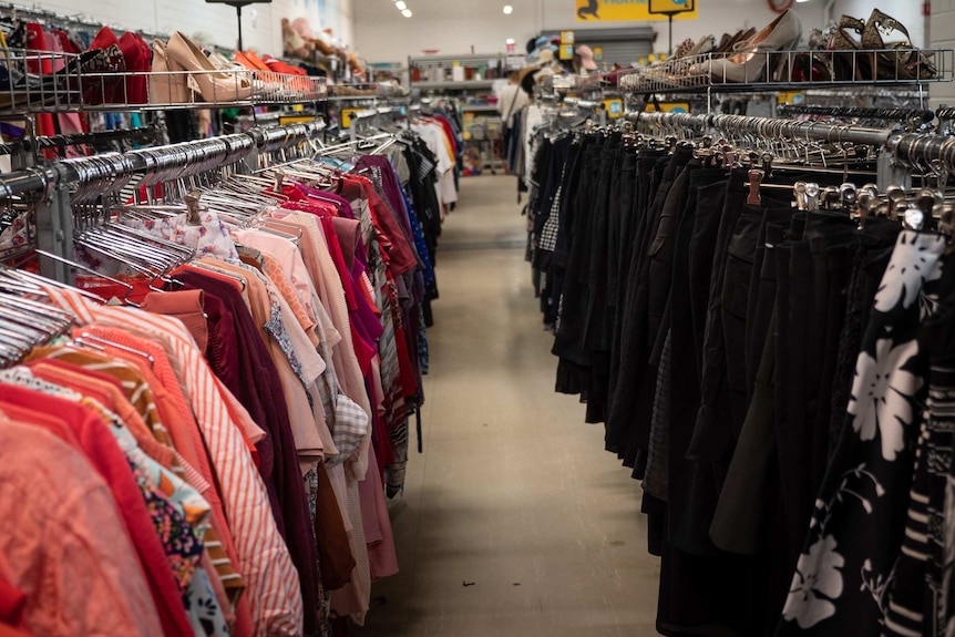 Racks of ladies clothing in an op shop