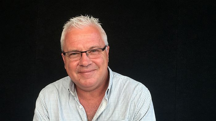 Matthew Condon smiling at the camera