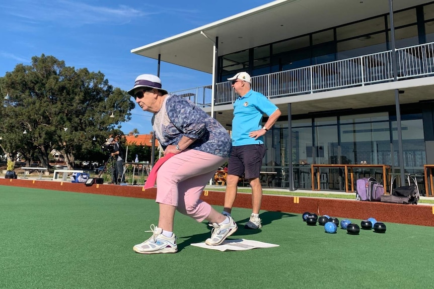 Chris Jackson bowls on the green at Fremantle Bowling Club.