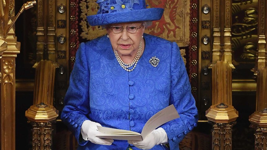 Queen Elizabeth II reads out a speech in the House of Lords.
