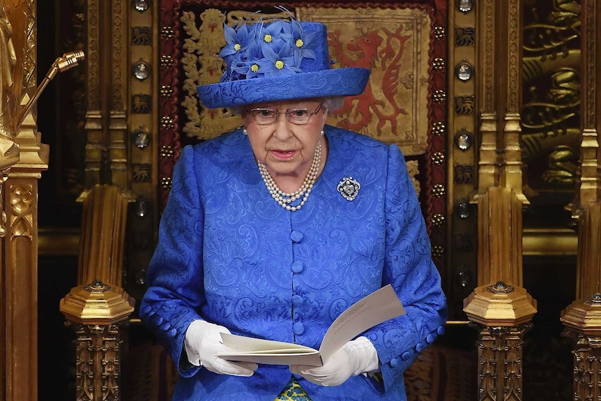 Britain's Queen Elizabeth II reads out a speech in the House of Lords.