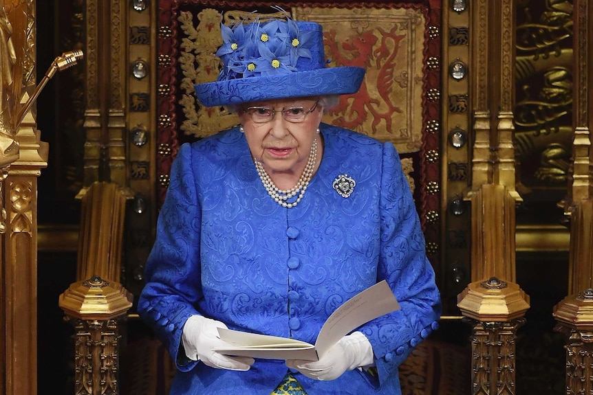 Queen Elizabeth II reads out a speech in the House of Lords.