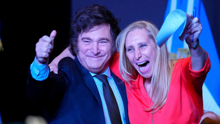 Presidential candidate Javier Milei, right, celebrates with his sister Karina after his victory speech.