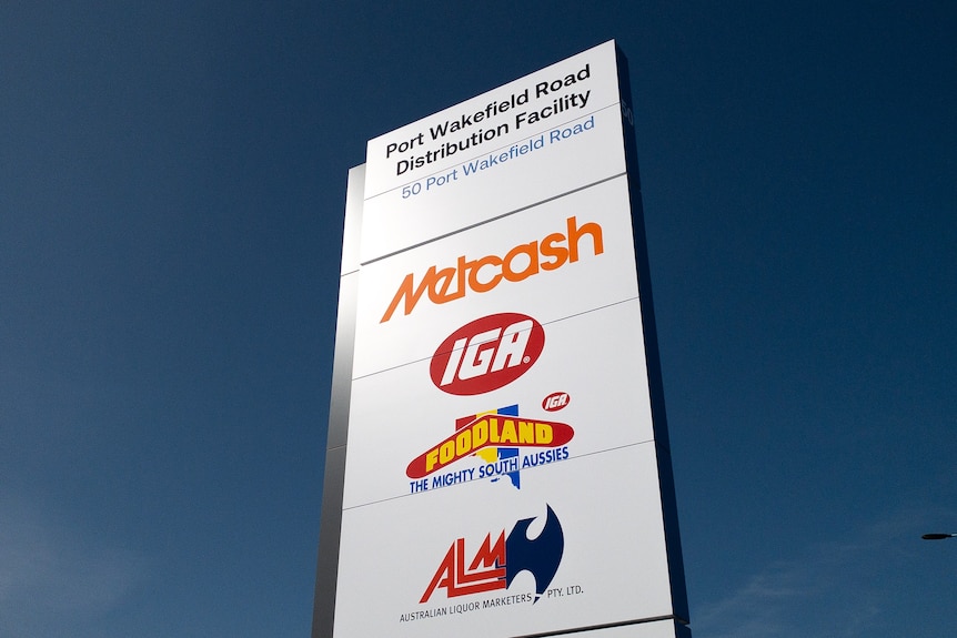 A large sign saying Metcash with other logos