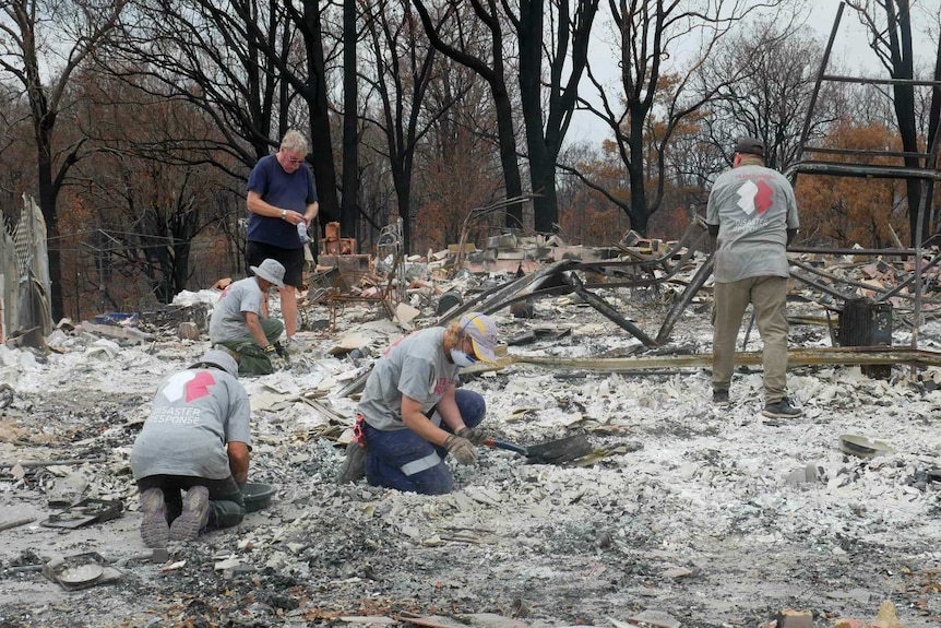 Sifting through bushfire wreckage with military precision