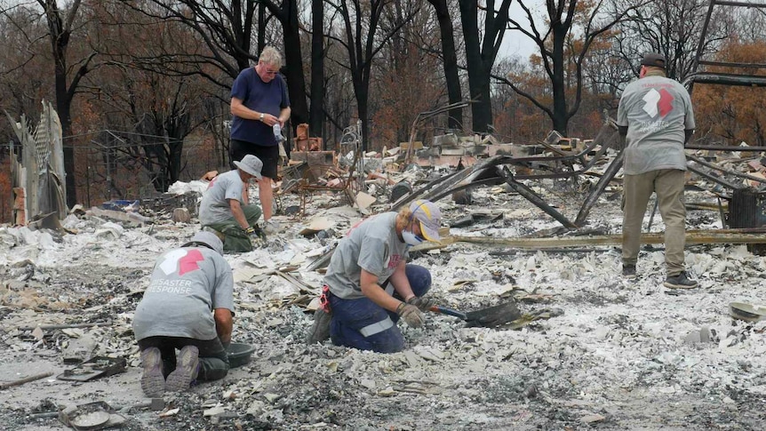 Sifting through bushfire wreckage with military precision