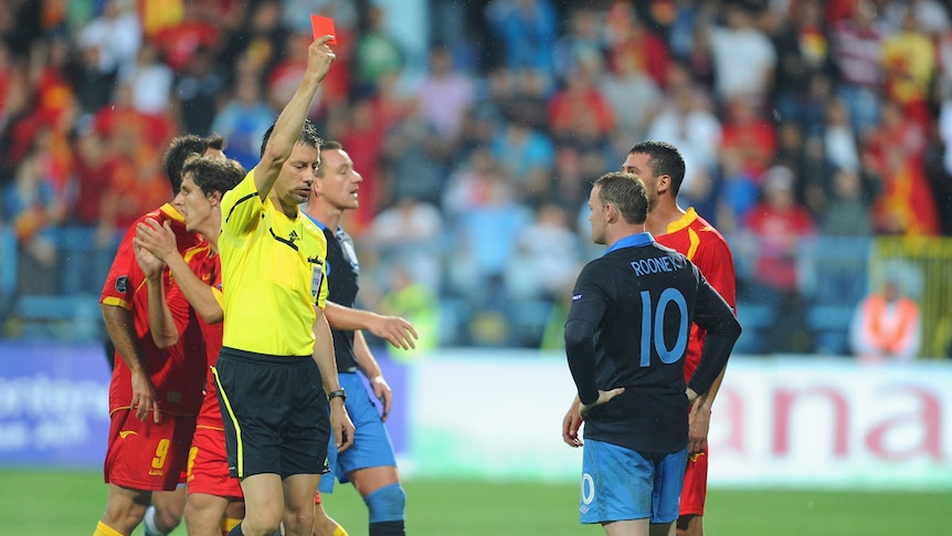 Wayne Rooney getting a red card from referee for England