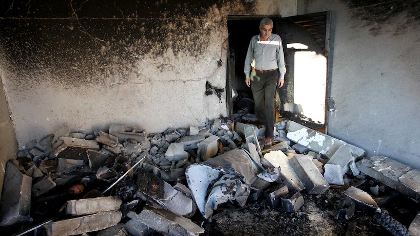 House of Palestinian named by Israel as murder suspect is blown up.