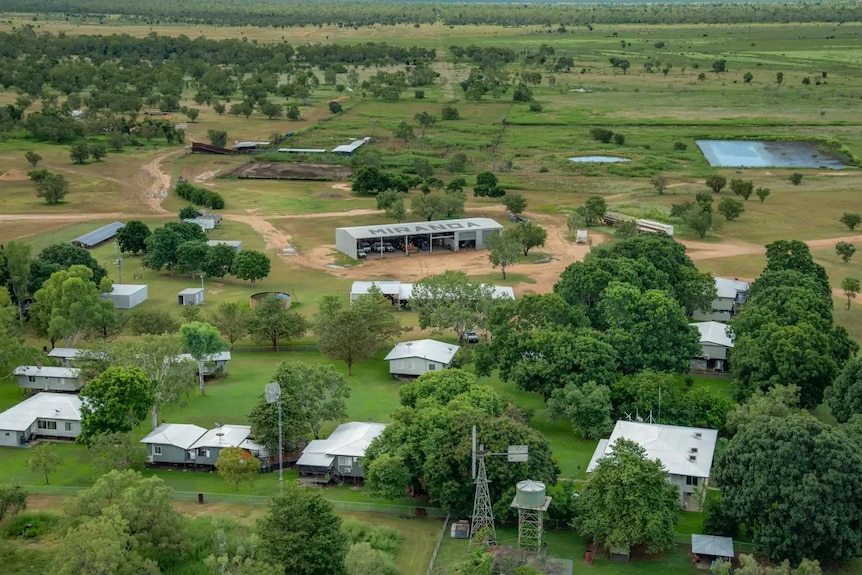 Miranda Downs Station from the air, showing buildings and green grass