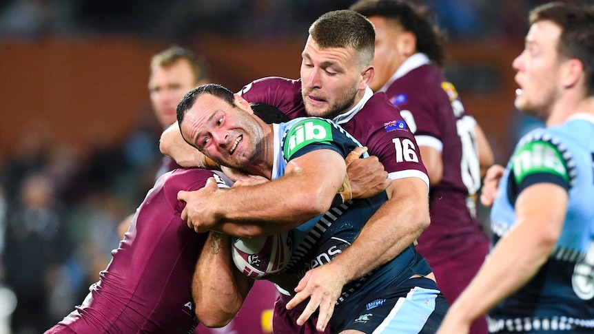 NSW Blues captain Boyd Cordner is tackled by Queensland Maroons' Jai Arrow in State of Origin.