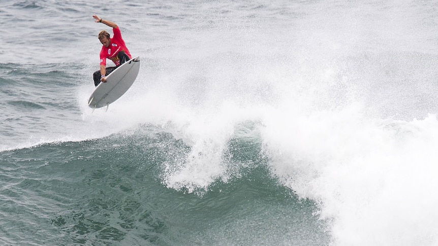 Josh Kerr tackles a big wave