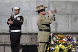 Bugler plays at Vietnam Veterans Day ceremony