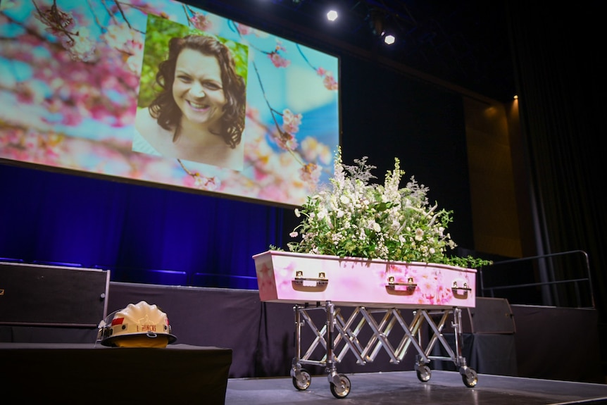 The coffin of a volunteer firefighter at her funeral.