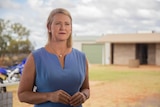 Northern Territory Deputy Chief Minister Nicole Manison stands outside a house in Alice Springs.